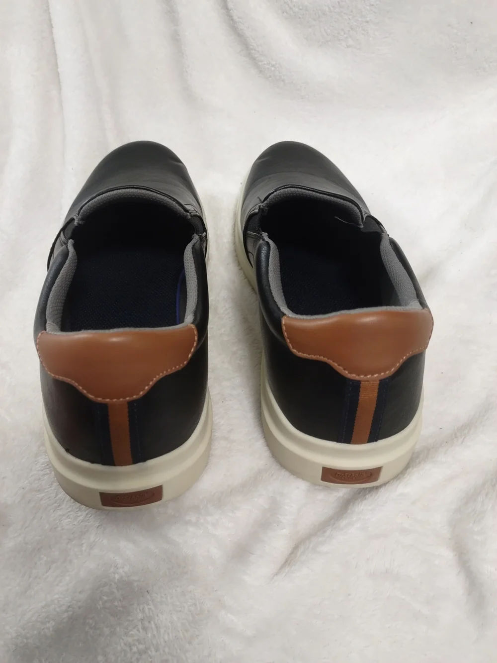 Dr. Scholl's Black Slip-On Loafers with Brown Heel Accent and Cream Sole